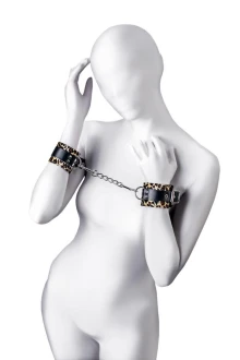 Kajdanki skórzane Kajdanki skórzane z karabińczykami regulowane– Anonymo Handcuffs PU Leather Print 19,5 cm